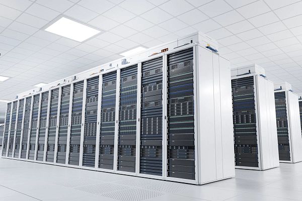 Modern data center with white server cabinets housing AI and large language model training clusters, representing advanced cloud computing and high-density cooling environments.