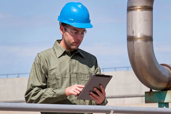 Facility Manager Monitoring Water Waste