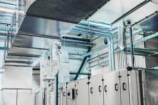 Side view of the huge industrial air handling unit in the ventilation plant room